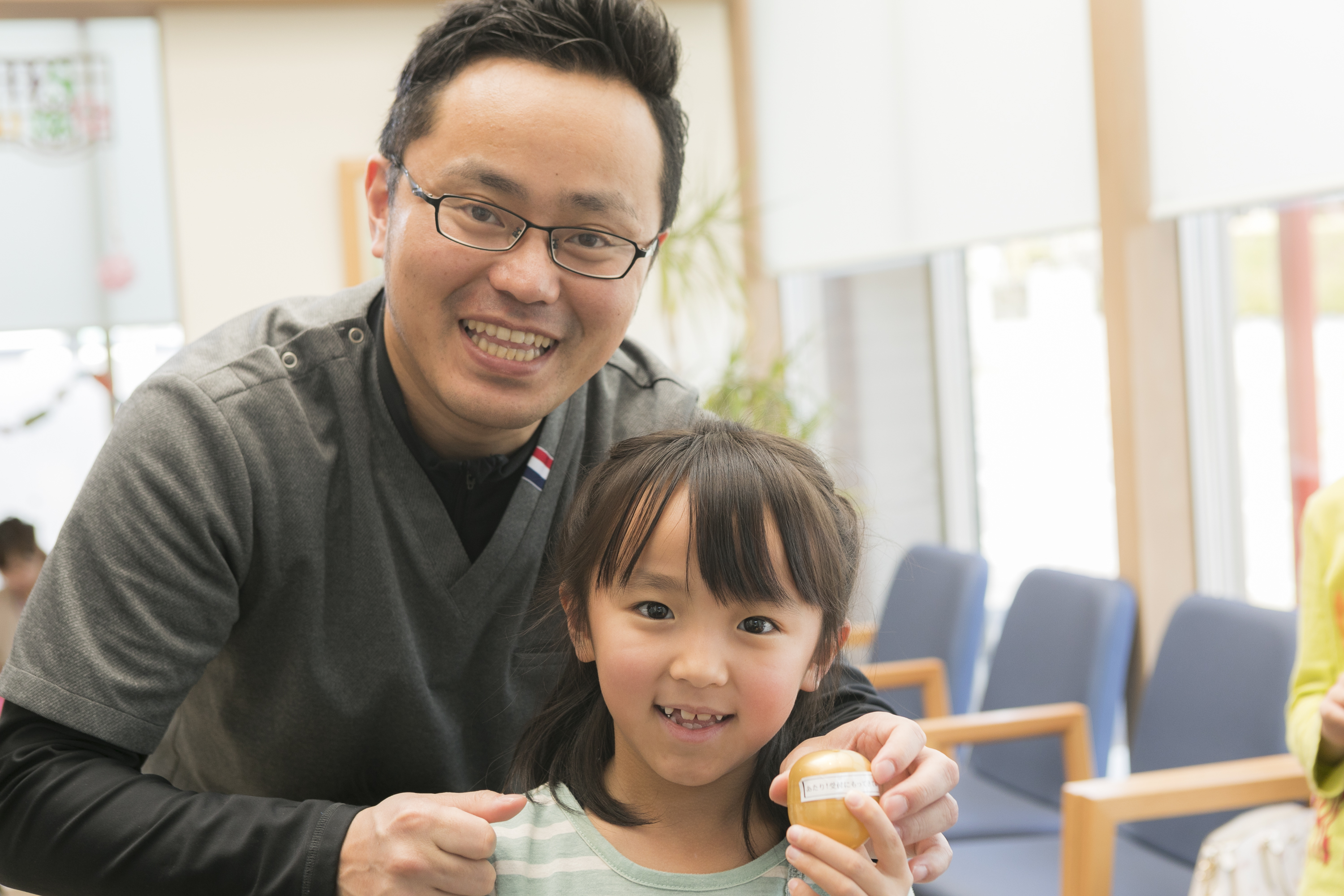 ヘッドギアによる臼歯関係の改善および上顎犬歯の開窓、牽引を行ったケース